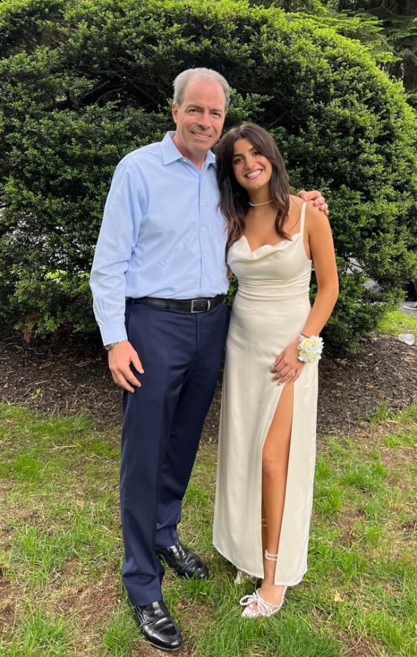 Richter is survived by three daughters. Above, he poses with one of his daughters earlier this year.
