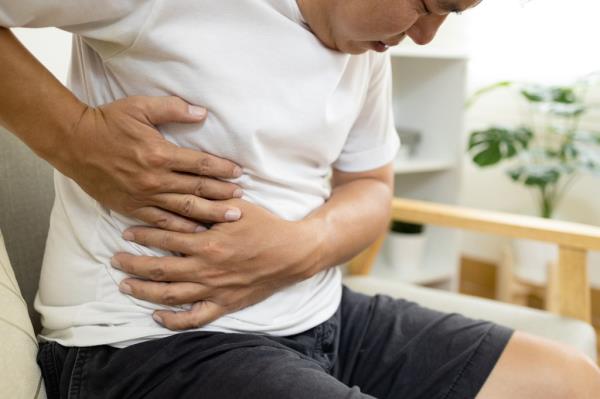 Asian male patient with abdominal pain on right side belly,painful in abdomen,irritable bowel