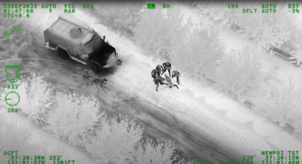 Police approach injured Dingler.